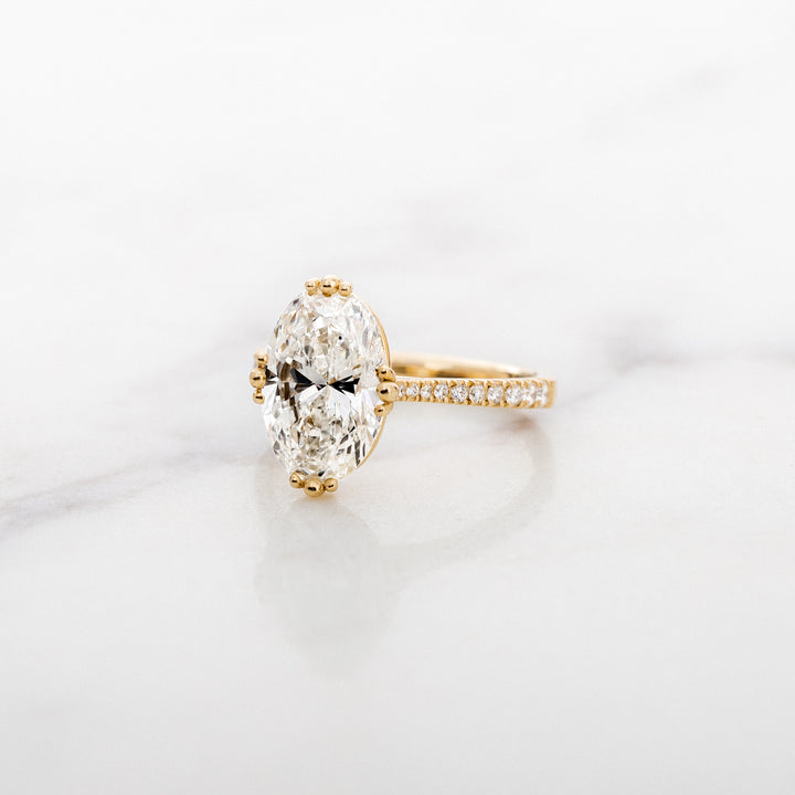 Tulip Oval Solitaire with Diamond Band