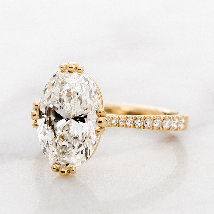 Tulip Oval Solitaire with Diamond Band