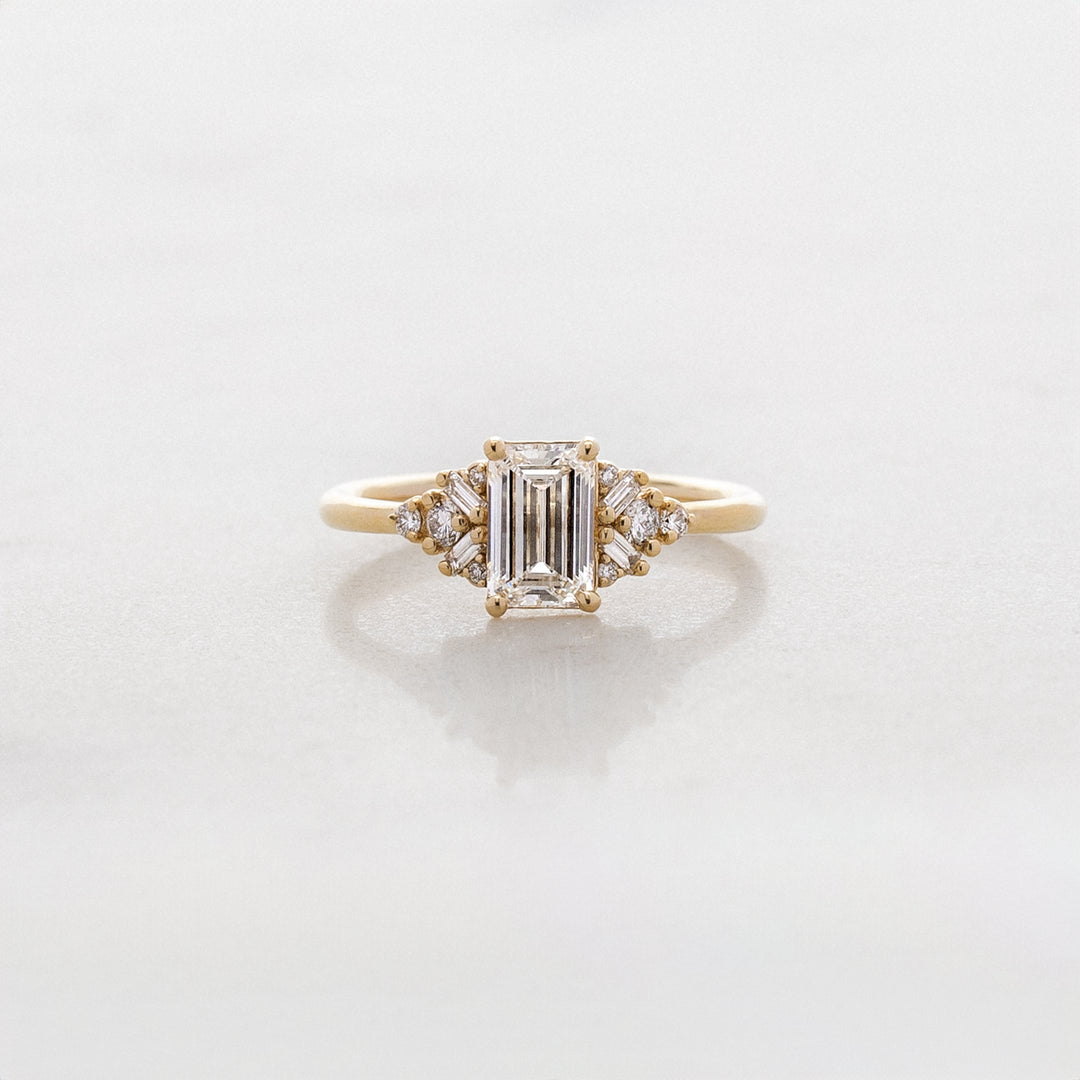 Foxglove Emerald Cut Side Cluster Ring