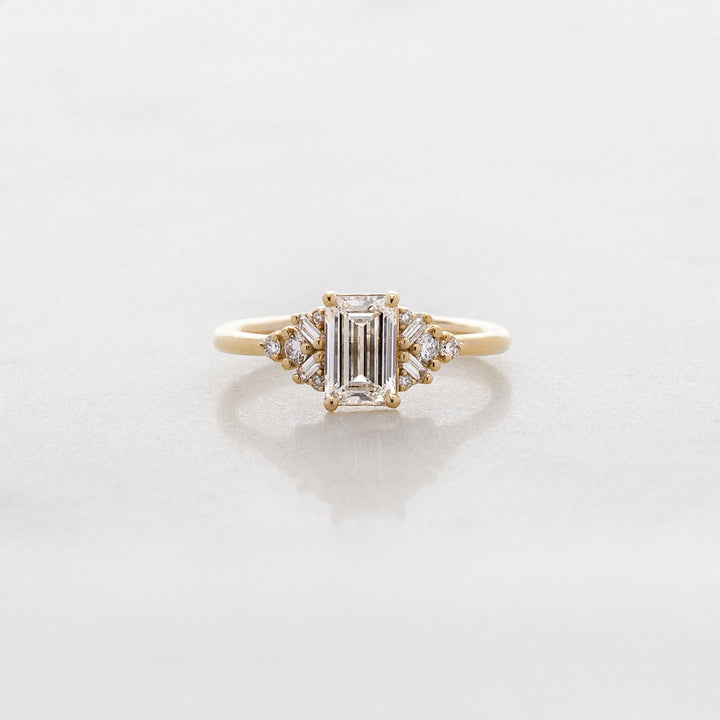 Foxglove Emerald Cut Side Cluster Ring