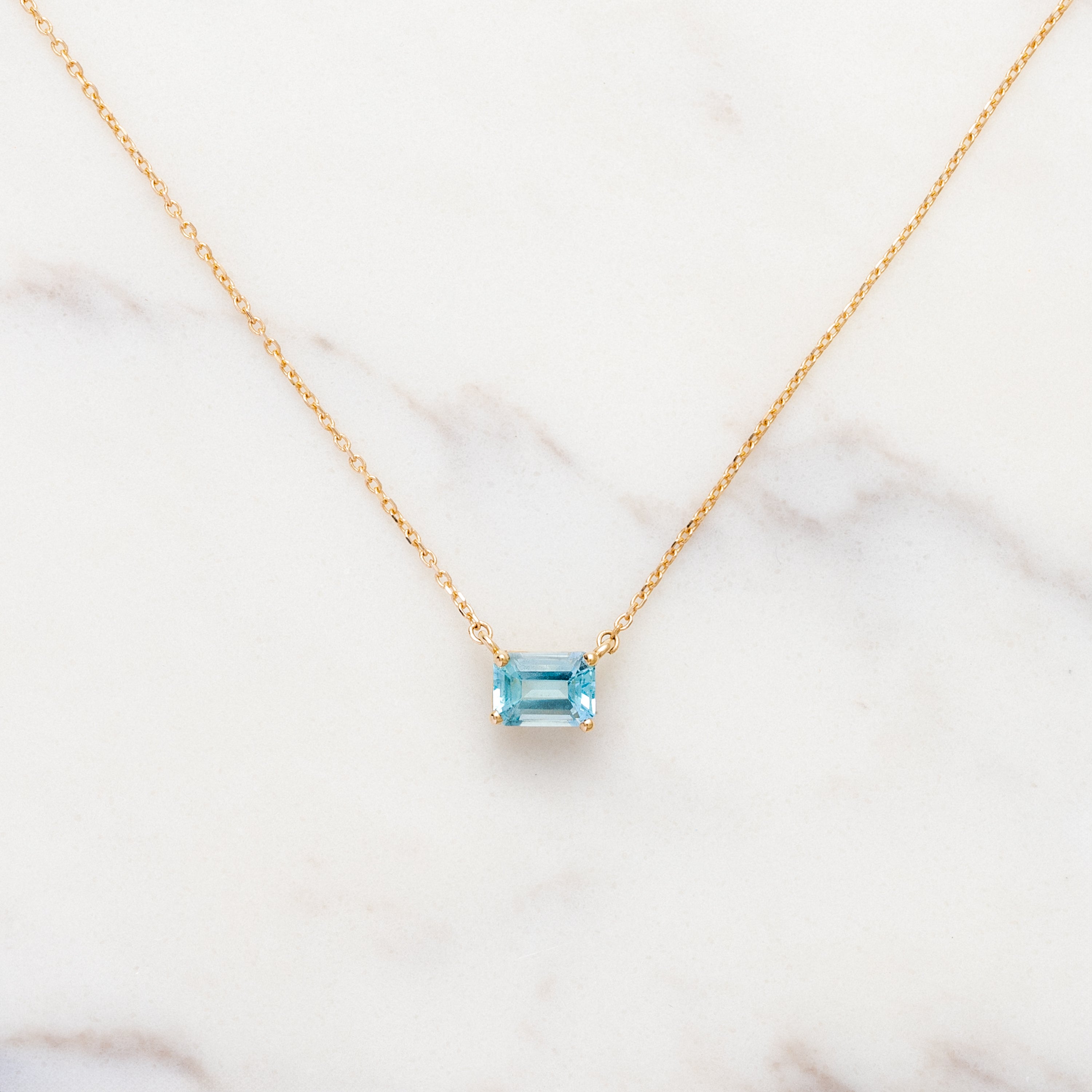 Emerald Cut Blue Topaz Necklace – Jenni Stuart Fine Jewelry