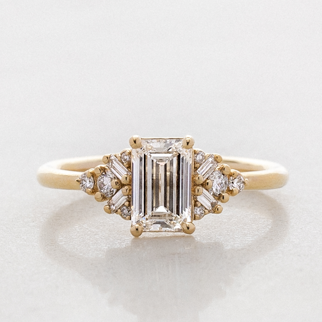 Foxglove Emerald Cut Side Cluster Ring