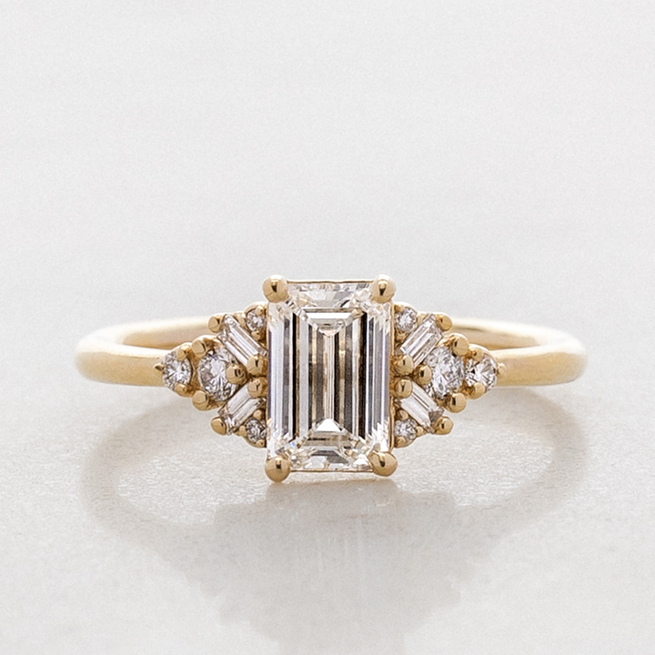 Foxglove Emerald Cut Side Cluster Ring