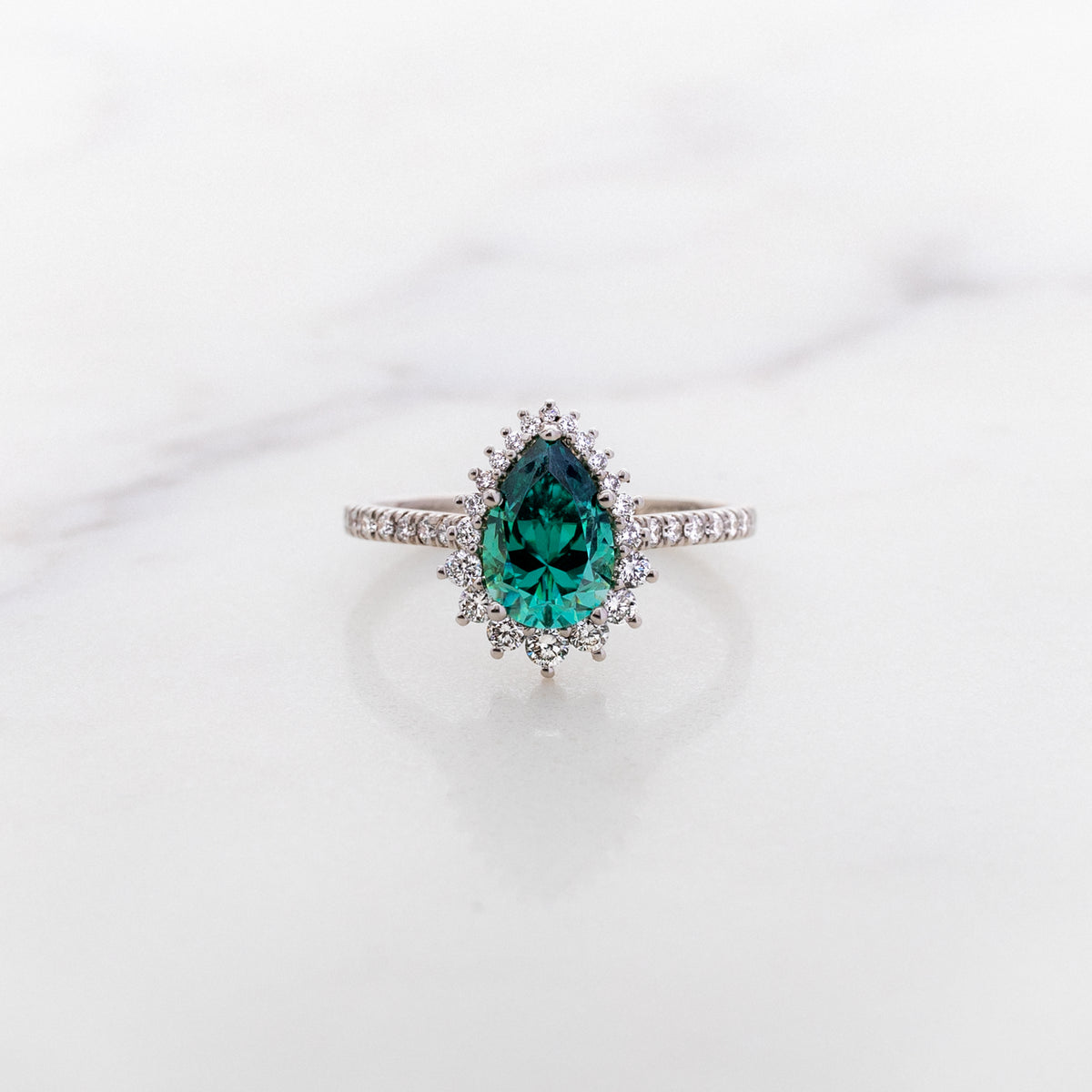 9x6mm Pear Cut Green Moissanite Halo Ring