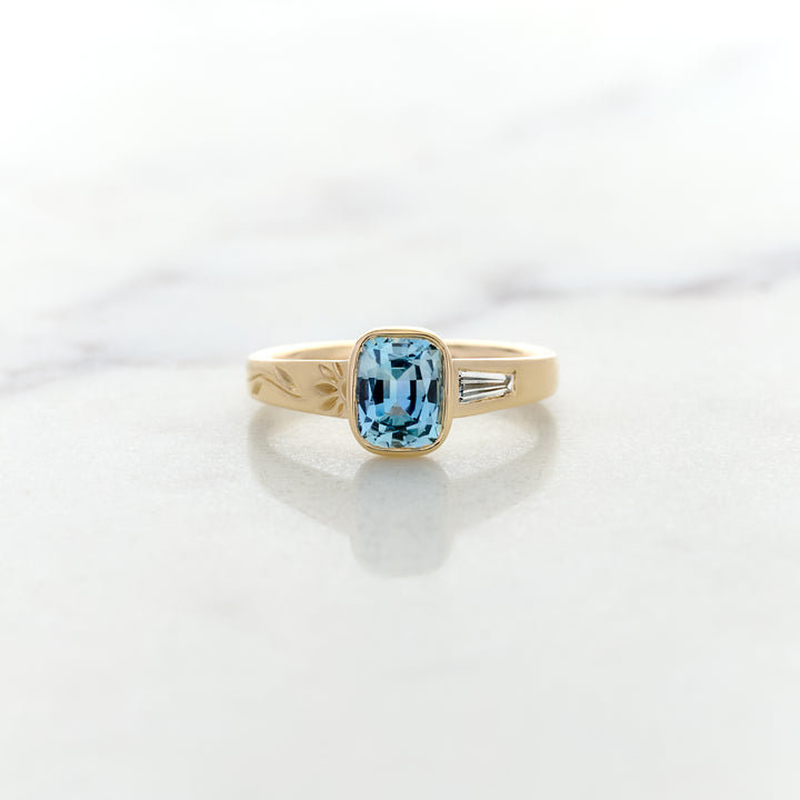 Asymmetrical Band Design for a Blue Sapphire