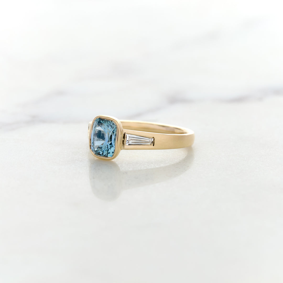 Asymmetrical Band Design for a Blue Sapphire