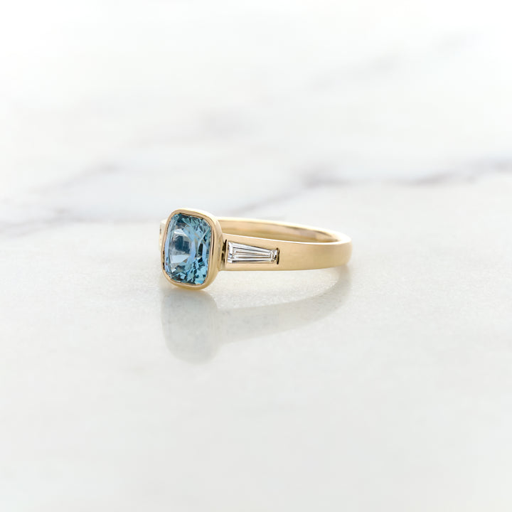 Asymmetrical Band Design for a Blue Sapphire