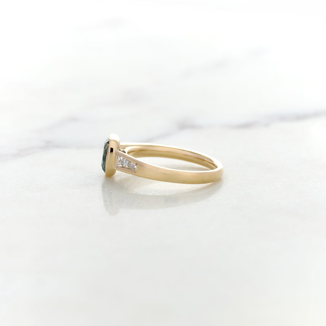 Asymmetrical Band Design for a Blue Sapphire