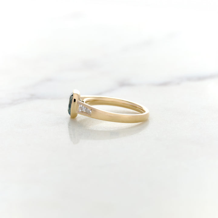 Asymmetrical Band Design for a Blue Sapphire