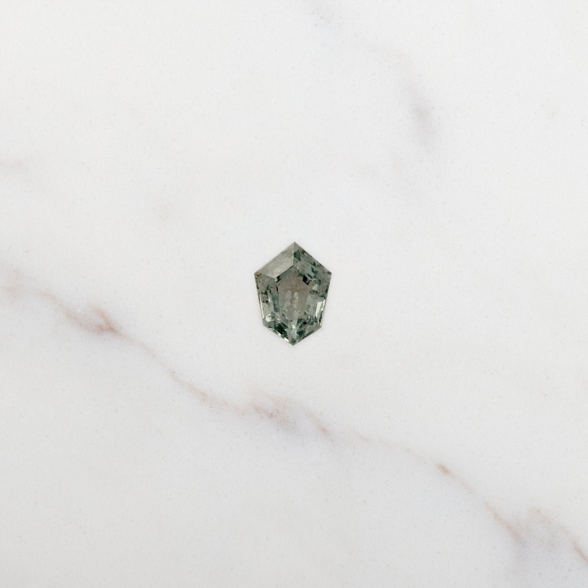 1.62ct Shield Cut Green Natural Galaxy Sapphire