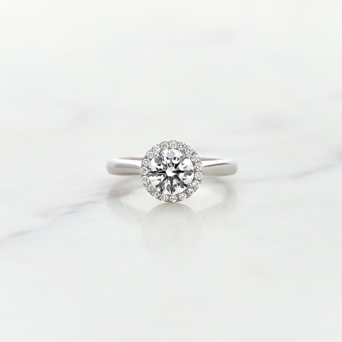 Round Lab Grown Diamond Halo Ring with Hidden Tulip