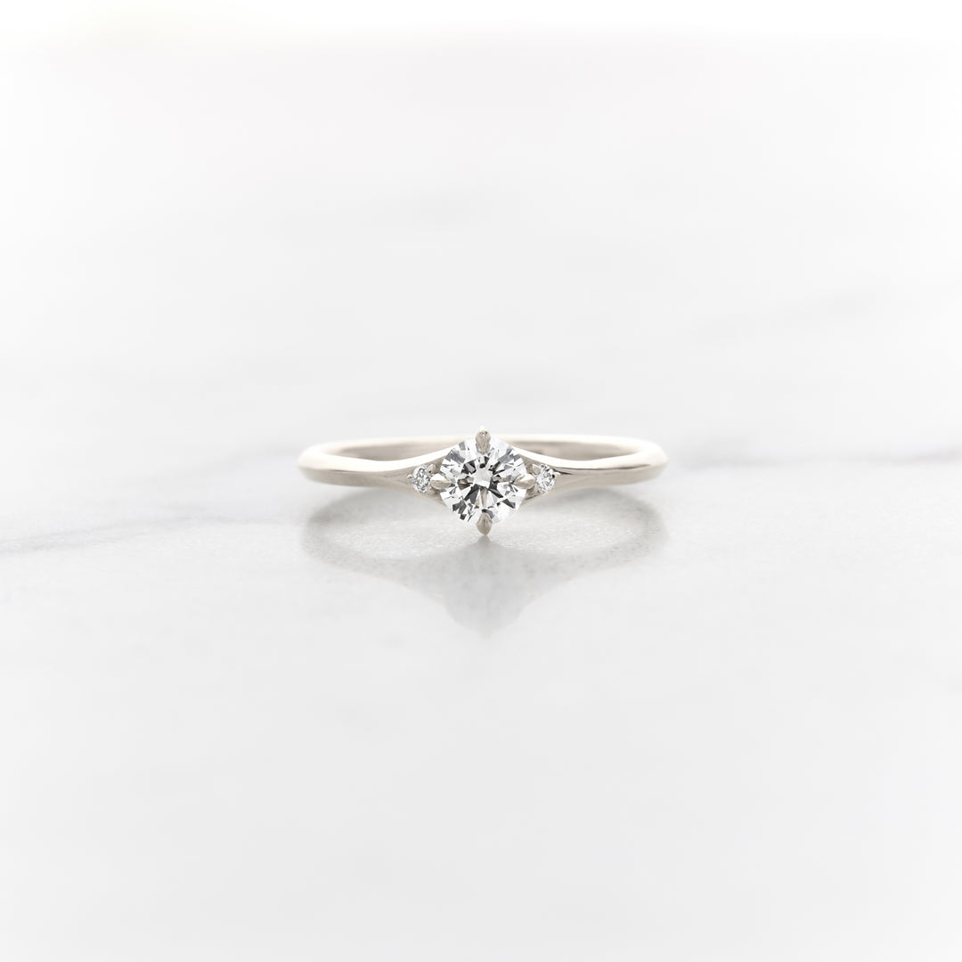 Petite Orchid Round Three Stone Ring