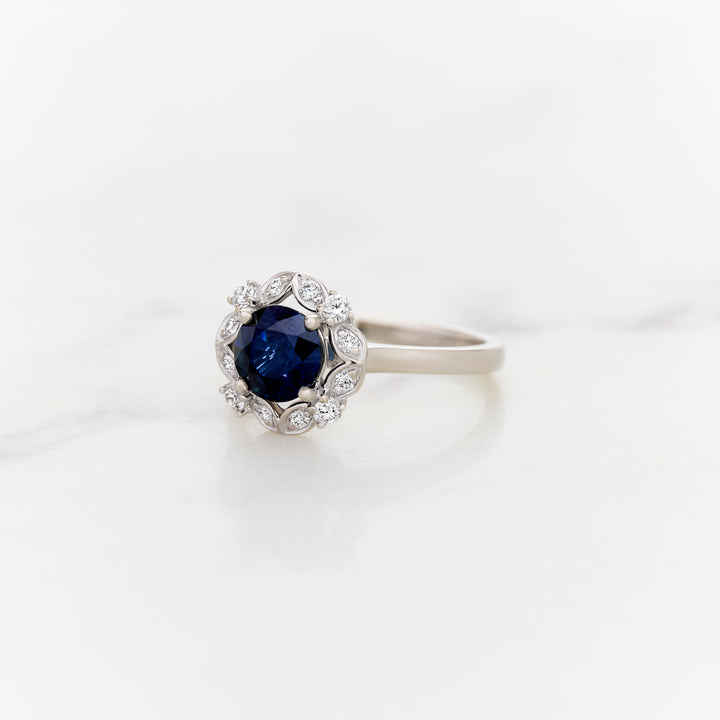 Round Blue Sapphire with Lacy Halo Ring
