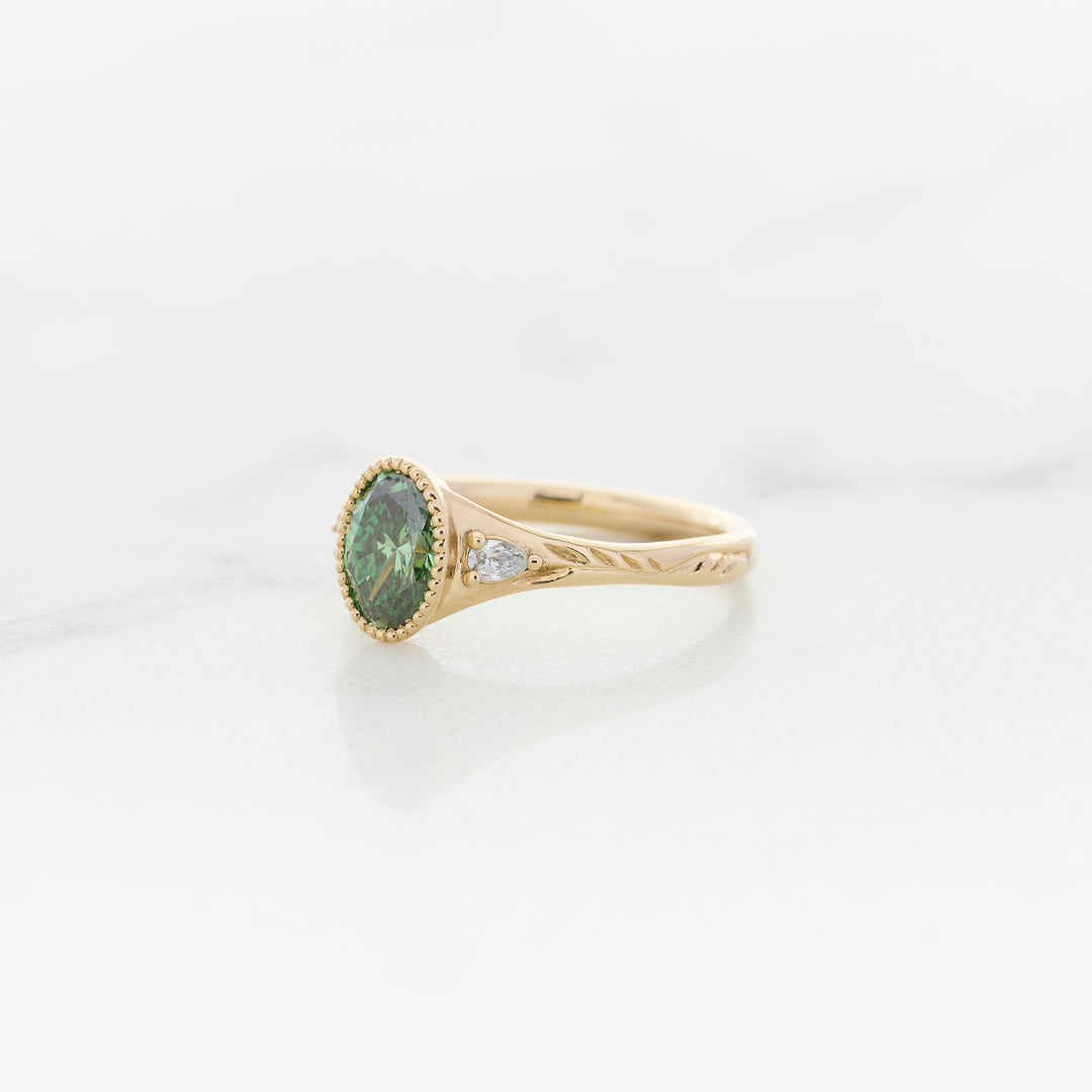 Green Diamond in an Engraved Band
