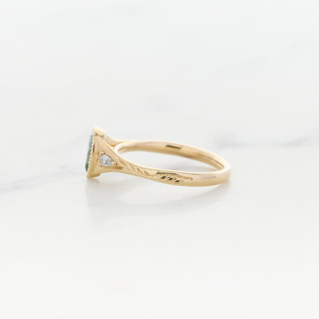 Green Diamond in an Engraved Band