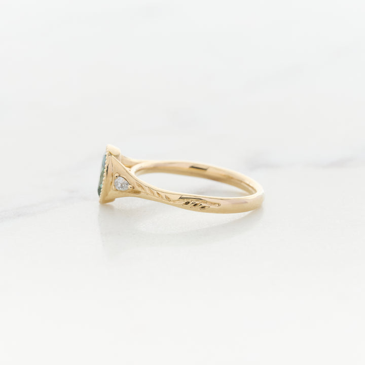 Green Diamond in an Engraved Band