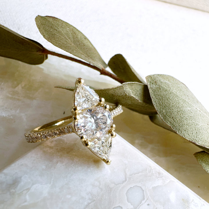 A Marquise Solitaire Look from a Three Stone Heirloom