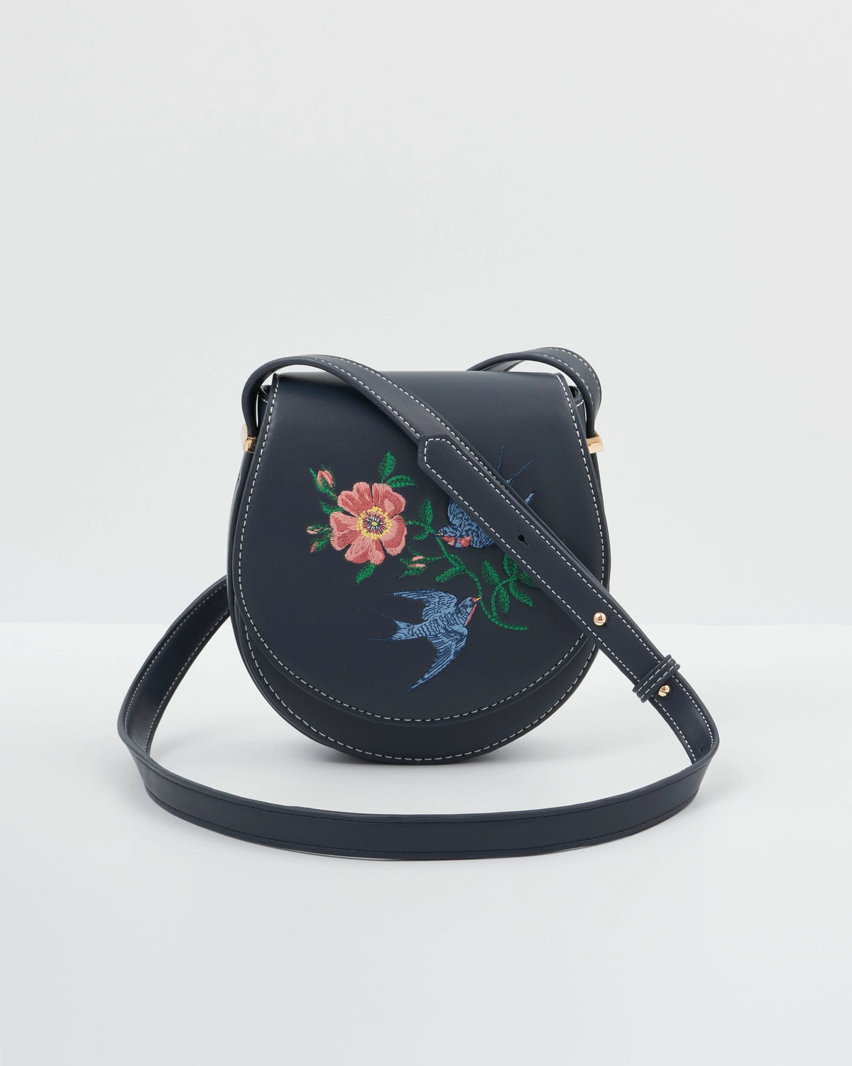 Fable Swooping Swallows Navy Mini Saddle Purse