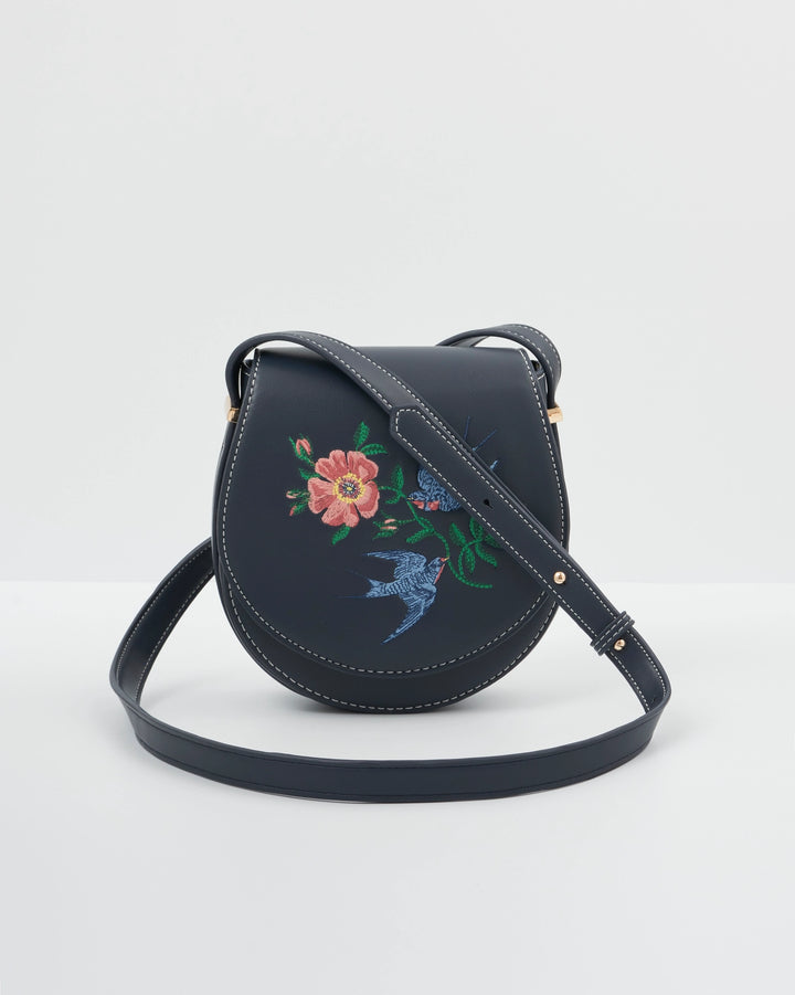 Fable Swooping Swallows Navy Mini Saddle Purse
