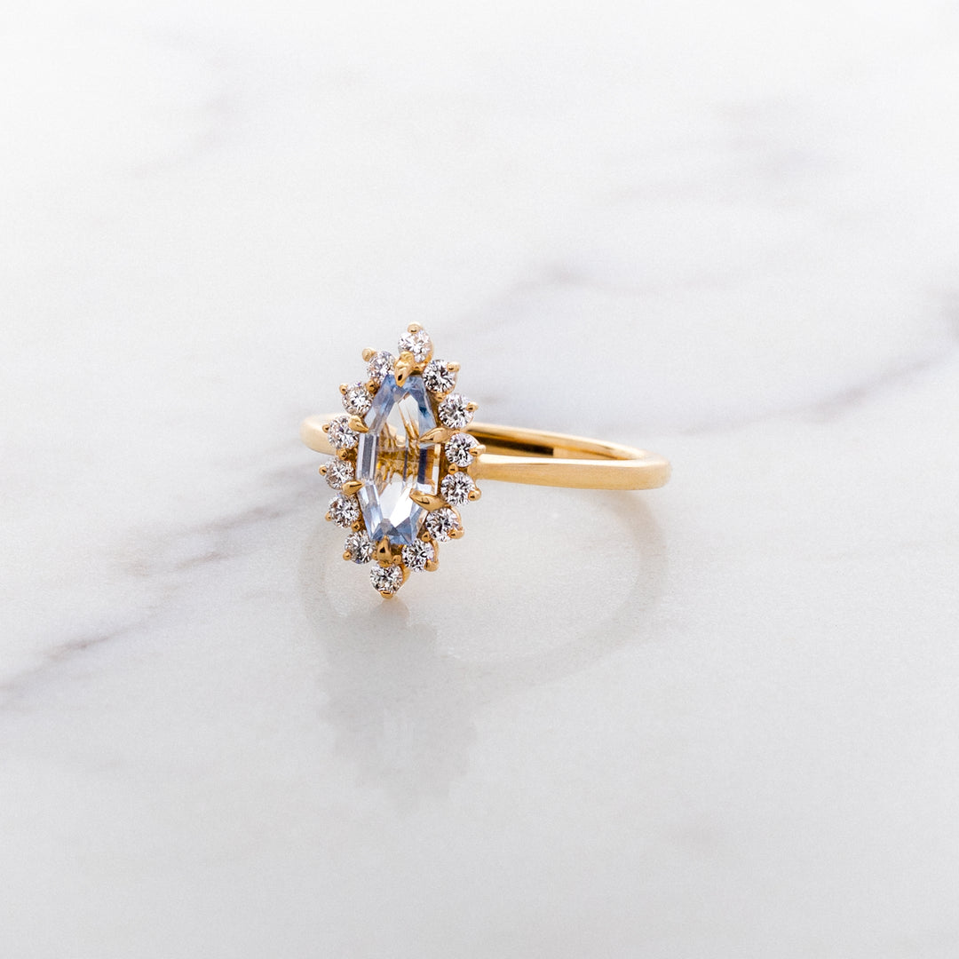 Step Faceted Marquise Sapphire Halo