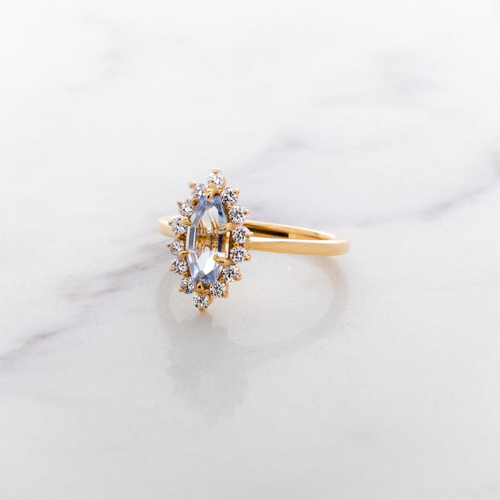 Step Faceted Marquise Sapphire Halo