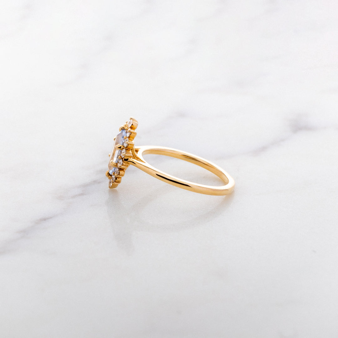 Step Faceted Marquise Sapphire Halo