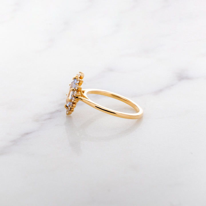 Step Faceted Marquise Sapphire Halo