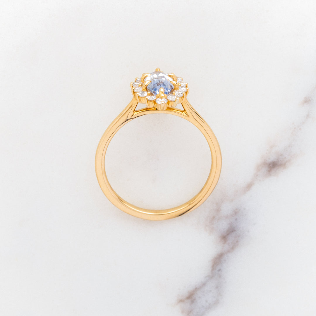 Step Faceted Marquise Sapphire Halo