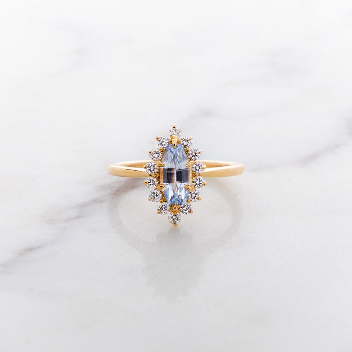 Step Faceted Marquise Sapphire Halo